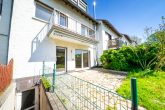 Familienfreundliches Reihenmittelhaus mit 5 Zimmern, Garten, Solaranlage und Garage in Glessen - Ansicht Gartenseite