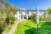 Familienfreundliches Reihenmittelhaus mit 5 Zimmern, Garten, Solaranlage und Garage in Glessen - Ansicht Gartenseite