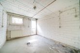 Familienfreundliches Reihenmittelhaus mit 5 Zimmern, Garten, Solaranlage und Garage in Glessen - Waschkeller