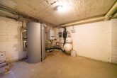 Familienfreundliches Reihenmittelhaus mit 5 Zimmern, Garten, Solaranlage und Garage in Glessen - Heizungsraum
