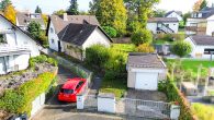 Charmantes Einfamilienhaus mit Einliegeroption, Garage und sonniger Terrasse in Sankt Augustin - Einfahrt mit Garage