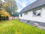 Charmantes Einfamilienhaus mit Einliegeroption, Garage und sonniger Terrasse in Sankt Augustin - Garten