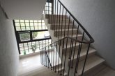Videobesichtigung: Moderne Eigentumswohnung mit Süd-Balkon und eigener Garage in begehrter Wohnlage! - Treppenhaus