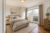 Großzügige 4-Zimmer-Maisonettewohnung mit Garten & Terrasse auf Erbpacht in Frechen - KI generiertes Beispielbild Schlafzimmer 1. OG