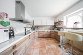 Viel Platz: Solides Einfamilienhaus mit Doppelgarage in familienfreundlicher Wohnlage! - hochwertige Einbauküche