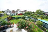 Videobesichtigung: Saniertes Einfamilienhaus mit Wintergarten und Süd-Terrasse! - Blick in den Garten