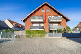 Elegante Maisonettewohnung mit 3-Zimmer-Potenzial, Südostbalkon und Stellplatz in Grevenbroich - Außenansicht