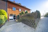 Elegante Maisonettewohnung mit 3-Zimmer-Potenzial, Südostbalkon und Stellplatz in Grevenbroich - Hauseingang