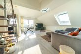 Elegante Maisonettewohnung mit 3-Zimmer-Potenzial, Südostbalkon und Stellplatz in Grevenbroich - Wohn- und Essbereich
