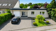 Bungalow mit 130 m² Wohnfläche + 40 m² wohnlicher Nutzfläche und Süd-Garten in Bergheim-Kenten - Außenansicht