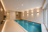 Bungalow mit 130 m² Wohnfläche + 40 m² wohnlicher Nutzfläche und Süd-Garten in Bergheim-Kenten - KI generiertes Beispielbild Pool
