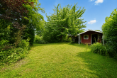 Charmantes Einfamilienhaus mit Garten, Teichanlage und wohnlich nutzbarem Keller in Elsdorf - Garten