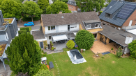 *Mehrgenerationenwohnen in 2 DHH mit Gartenparadies in familienfreundlicher TOP-Lage von Königsdorf* - Rückansicht
