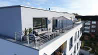 Moderne Penthousewohnung im Herzen von Leichlingen mit Dachterrasse, Effizienz A+ und Garage - KI generiertes Beispielbild Dachterrasse