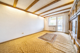 3 bis 4-Zimmer-Eigentumswohnung mit Balkon und Garage in Köln-Bilderstöckchen - Wohnzimmer