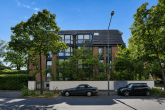 Mitten in Marienburg! Stilvoll, komfortabel & lichtdurchflutet: Etagen-ETW mit Balkon & Tiefgarage! - Seitenansicht
