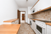 Mitten in Marienburg! Stilvoll, komfortabel & lichtdurchflutet: Etagen-ETW mit Balkon & Tiefgarage! - Küche