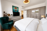 Exklusive Penthousewohnung mit Süd-Dachterrasse & Tiefgaragenstellplatz in Köln-Junkersdorf - klimatiesiertes Schlafzimmer