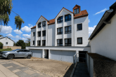 Wohnen auf zwei Ebenen! Helle Maisonettewohnung mit Balkon und Garage in Köln-Mengenich - Außenansicht