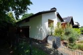 Handwerker aufgepasst: Sanierungsbedürftiges EFH in TOP-Lage auf Traumgrundstück am Holzlarer Park! - Seitenansicht Park
