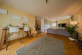Charmantes Familiendomizil in Bestlage von Rondorf: 109m² Wfl. + 21m² Wintergarten mit Kaminofen - Wohnzimmer