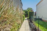 Charmantes Familiendomizil in Bestlage von Rondorf: 109m² Wfl. + 21m² Wintergarten mit Kaminofen - Zuweg Garten