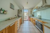 Charmantes Familiendomizil in Bestlage von Rondorf: 109m² Wfl. + 21m² Wintergarten mit Kaminofen - Küche