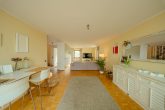 Charmantes Familiendomizil in Bestlage von Rondorf: 109m² Wfl. + 21m² Wintergarten mit Kaminofen - Wohnzimmer