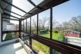 Exklusives Wohnensemble mit Pool, Traumgarten & flexiblen Nutzungsmöglichkeiten in Leichlingen - Wintergarten Whg Nr. 2