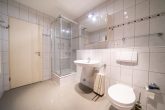 Moderne 3-Zimmer-Wohnung mit Balkon und Tiefgarage in Köln-Brück - Badezimmer