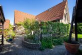 Energieeffizienzklasse A: Großzügiges EFH mit 2 Garagen und neuer Wärmepumpe in Bergheim-Büsdorf - Terasse / Garten