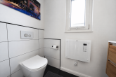 Exklusives KfW-40-Plus Einfamilienhaus mit Smart Home, Sauna & Doppelgarage in Bedburg-Kaster - Gäste-WC
