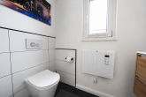Exklusives KfW-40-Plus Einfamilienhaus mit Smart Home, Sauna & Doppelgarage in Bedburg-Kaster - Gäste-WC