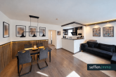 Moderne 3-Zimmer-Eigentumswohnung mit Balkon & Garage zentral in Leverkusen-Bürrig - Wohn- und Esszimmer
