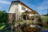 Pulheim-Sinthern: Reihenendhaus mit großem Garten, Garage und Stellplatz - Terrasse und Fischteich